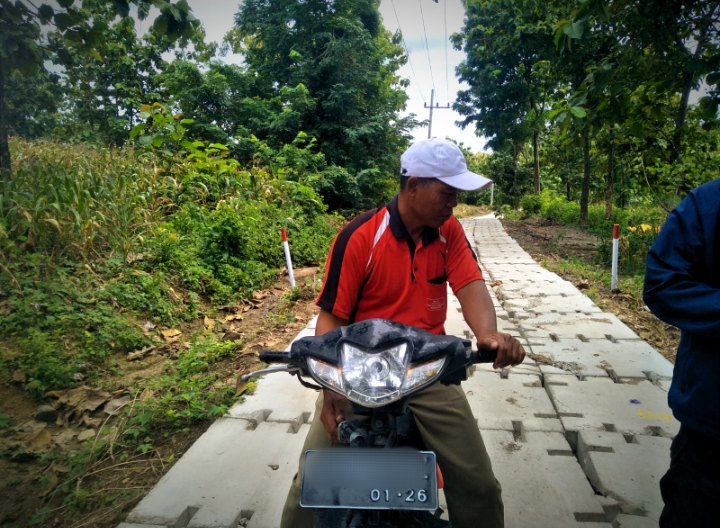 Viral! Jalan di Temayang Mirip Puzzle Rusak, DPU Bina Marga : Belum Selesai